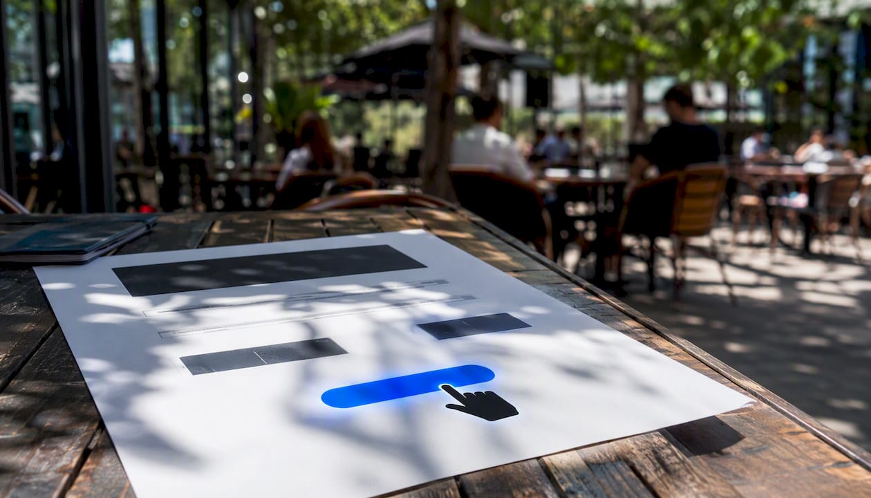 Cursor hovering over electric blue CTA button mockup