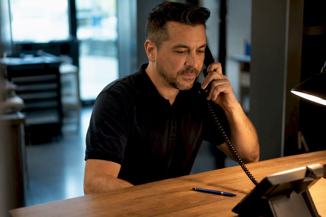 Business owner answering a service call